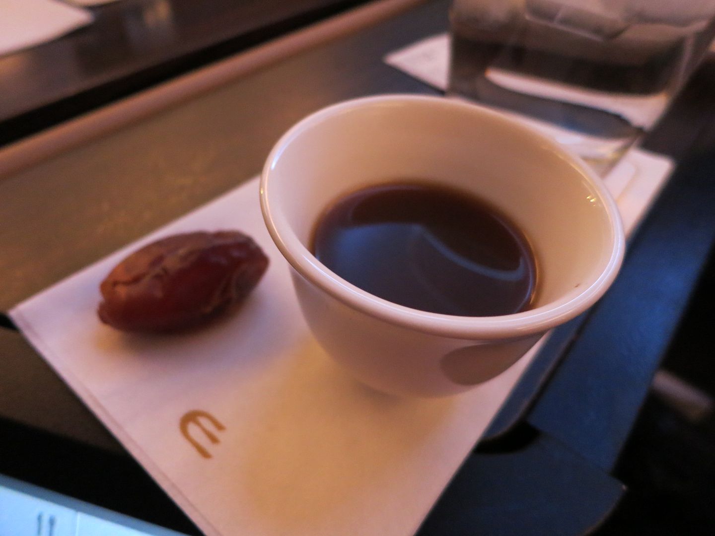 Etihad First Class cabin IAD-AUH coffee dates