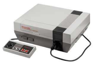 800px-NES-console-with-controller-png.png